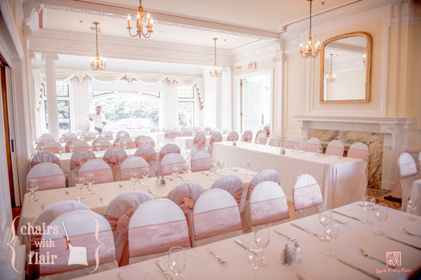 Pink & Latté organza sashes on white banquet chair covers