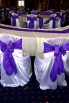 white_wraps_royal_purple_sashes